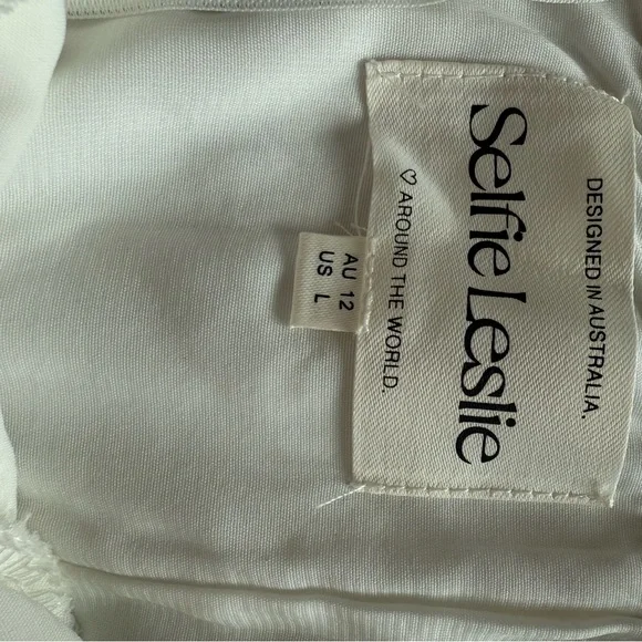 Elegant White Strapless Romper - Picture 5 of 8